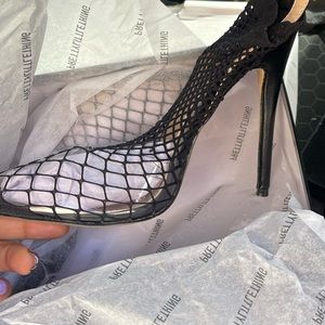 Black heels with fish net